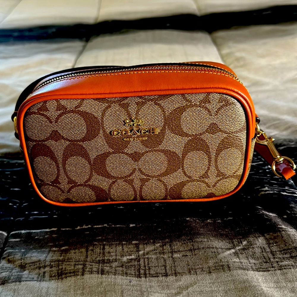 Tan/ Orange Coach Wristlet Canvas